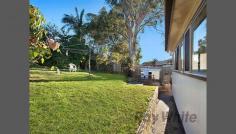  22 Scenic Drive Budgewoi NSW 2262 In Town Convenience High set with water views and favoured north-easterly aspect to capture soothing summer breezes and warm winter sunshine, this 2 bedroom home with built-ins, family room and the nostalgia of easy-care polished timber floors throughout is just a stroll from community shopping centres, lake and ocean beaches. With modern bathroom and lots of extras including air conditioning, first home buyers and investors will find much to please them in a home that has lots more on offer than the price suggests so call today for inspection. General Features Property Type: House Bedrooms: 2 Bathrooms: 1 Land Size: 575 m² (approx) Outdoor Features Garage Spaces: 1 