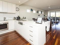  1/93 Bilyana St Balmoral QLD 4171 Committed Owners Say SELLHuge covered west-facing terrace.... Barbeque sizzling.... Outdoor bar fridge stocked.... And all your favourite people sitting around an oversized table enjoying the afternoon sunshine! This modern, air-conditioned apartment offering that 'entertainer's edge', promises peaceful, yet incredibly convenient living.  Set in a block of only six and without neighbours above or directly below, life here is significantly quieter than in most apartments! And, it's almost impossible to believe this property is literally seconds from Riding Road bus transport, metres from thriving Oxford Street and a short stroll to a vast array of cafés. As you step inside, spacious open plan kitchen and living areas, high ceilings and plenty of natural light make you feel instantly comfortable. Neutrally finished and with timber floorboards throughout, you can see that making this apartment 'your own' would be easy. And the modern kitchen featuring white stone benchtops and stainless steel Bosch appliances enhances the indoor living/entertaining area. The apartment features split-system air-conditioning units in all rooms, new remote ceiling fans and retractable sunshade on the front terrace. Likewise, an additional balcony off the kitchen (housing a full-sized clothes line), lockable gate separating the home's entrance from the rest of the complex and fly-screens on the huge terrace doors allow refreshing breezes to flow freely through the apartment all year round.  Additional Property Features include: * 2 great-sized bedrooms. Master with its own Juliet balcony, walk in robe and ensuite (featuring double shower). The second bedroom includes built in robes. * 2nd generous bathroom. * Large European Laundry. Separate linen Press. * Wiring for surround sound/home entertainment, as well as Foxtel in lounge and master bedroom. * Double remote lock-up garage with heaps of storage. * Security Intercom with remote gate locking/unlocking system. * Brand new 160Litre electric hot water system. * Pets permitted subject to Body Corporate approval. * Huge rental appeal for those seeking a low-maintenance, well-positioned investment property. With the contemporary design, great use of indoor/outdoor spaces, quiet street and convenient location, come and see why not all apartments are created equal! 