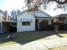 5 Chertsey Ave Bankstown NSW 2200 RARE OPPORTUNITY Older style cottage with charming presentation. Three double bedrooms, formal living room, separate dining, large family room, and kitchen with gas cooking. Good land approx 575 sqm zoned 2B residential, north facing yard, side vehicle access. Short walk to station, shops and schools including St. Brendans. Renovate or Re Develop Auction on site Saturday 20th September, 2014 at 1:00PM Details:Carl Zaubzer 0418 265 589 Property:    House Bedrooms:    3 Bathrooms:    1 Parking:    1 Land Size:    575 Sqm Rooms:    Lounge/Living Dining Room Local Amenities:    Schools Railway Station Bus Service Shops Council:    Bankstown