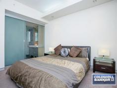  116/22 St Georges Terrace Perth WA 6000 SPECTACULAR PRESTIGE APARTMENT Unbeatable VIEWS in an absolute prime CBD location! This apartment is sublime – located near the Governor’s Gardens in St Georges Terrace – this property can truly be described as ‘spectacular’. The expansive views of Kings Park, the Swan River and Perth City from this 18th level luxury apartment are both delightful and irreplaceable. The building features full security access, with undercover gated parking, and stylish quality finishes throughout. The foyer and lobby of this building make it one of Perth’s most impressive residential entry foyers, featuring granite floors, marble, timber and stainless steel, enhanced with unique contemporary design elements. The high quality flows throughout the building, with features such as full height timber entry doors to each apartment, solid marble kitchen counter and benchtop, feature concealed lighting, granite and marble bathrooms, timber floors, frosted glass robe doors, timber custom cabinetry and 2 fully ensuited bathrooms – one for each of the two bedrooms! Upon entering this apartment, you will immediately be impressed by the spectacular uninterrupted views, reaching as far as the eye can see. This front row property is graced with the view of the beautiful Swan River 24/7, and is literally only a couple of hundred metres and within easy walking distance of the Hay St Mall and the Perth shopping and business precincts. This apartment is currently leased to a corporate client at $800pw – so it is suitable for an investor – ready made with this quality tenant, and it is also ideal for an owner occupier who wants this outstanding property for themselves, at today’s price, to move into in the future whilst collecting the rent in the meantime. Either way – the lofty height and incredible views from this 18th level residential luxury apartment deserve your inspection. Call Dan Ehrenfeld on 0404 877077 to arrange for further information or to arrange a viewing. Please call now as this well priced property will not last. 