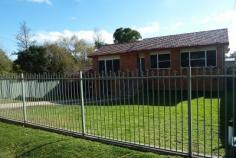  124 Mortimer St Mudgee NSW 2850 An outstanding opportunity to secure a large family home just two blocks
 from the Mudgee CBD and short walk to schools. Multiple living spaces, 
large bedrooms and excellent shedding are features of this spacious 
home. 
 
- Huge open plan kitchen, dining and family room 
- Separate spacious lounge room 
- 3 large bedrooms, main with walk-in robe and en-suite 
- Perfect northerly aspect to the rear of of home 
- Beautiful elevated views from the lounge / dining area 
- Large block of 948sqm with drive through to the rear 
- Huge undercover area downstairs 
- Garage, carport and storage shed 
 
Very central location, less than 2 blocks from the CBD. 