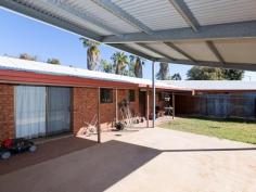  1 Bauhinia Ct East Side NT 0870 This is a rare investment opportunity to benefit from a unique property 
in EAST SIDE. Situated on a 1320m2 corner allotment you will find 2 x 3
 bedroom duplex on one title. This is the perfect time for not 
just investors but mums and dads alike to take the initiative and take 
advantage of this potential blue chip investment! The property 
consists of two solid brick three bedroom one bathroom dwellings. One 
duplex has a renovated kitchen. Both have built in robes in all 
bedrooms, evaporative air conditioning throughout and split systems in 
the open plan living areas. The kitchens are spacious with breakfast 
bench and gas cooking. The centrally located bathrooms have large
 showers, bath and vanity. The toilet is also separate for that added 
convenience. There is also an extra linen cupboard in the hallway. Other
 features include back verandah, garden shed, undercover parking and 
great sized private yards. The property also has a fully lined shed out 
the back. Why not live in one and rent out the other. With minor
 maintenance and a rental potential of $920 plus, this property is worth
 a definite look. Call me now to avoid disappointment! Expressions of Interest close 2pm on Friday 26th September, 2014. 