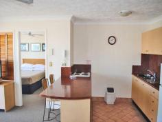  210 Surf Parade SURFERS PARADISE Qld 4217 AFFORDABLE & SPACIOUS and CLOSE to the NEW LIGHT RAIL  * One Bedroom One Bathroom Unit  * Floor Size Approx 55M2  * One Floor from the Top Level  * Brand New Carpet  * B/Corp $103 per week  * Council Rates $2488 per annum  * Sinking Fund Healthy Approx $500,000  * Holiday Letting Income Approx $25,000 per annum  ' Surf Parade Resort ' is a Boutique Building , of 9 Levels , exquisitely maintained to an extremely high standard .. Amazing Tropical Gardens lead to Heated Pool , Spa , Tennis Court , Gym , BBQ Lounge , Sauna whilst situated close to the Beach and Broadbeach.. Expansive views of the Hinterland and the Ocean . Five Star Resort Facilities , Immaculate Throughout ...First to see will buy . 