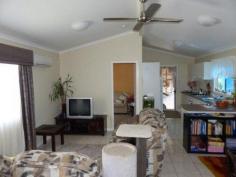  18/978 Pimlico Road Wardell NSW 2477 LOW MAINTENANCE Immaculately presented 5 year old 2 bedroom cottage. Air conditioned combined lounge and dining room. Kitchen features gas cook top and oven with electric grill. Main bedroom with built-in robes and good size 2 way bathroom. North facing verandah facing the lush, low ware gardens. Single lock-up garage with work bench, shelving and mezzanine floor for storage. Pet friendly park. This low maintenance property is a delight to inspect and is benefited by park amenities including the pool. General Features Property Type: House Bedrooms: 2 Bathrooms: 1 Outdoor Features Garage Spaces: 1 