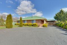  23 Louisa St Kempton TAS 7030 Property Information Entertainers Dream  This three bedroom home really has something to offer for every member of the family. This immaculate home offers a huge covered entertaining area which is as large as the house the is perfect for all year use! This is a ideal area for the kids to still get fresh air and ride their bikes during rainy days. It truly feels like an extension of the home and will be thoroughly enjoyed by all. This also allows for under cover parking for your vehicle as well as an abundance of off street parking.  The house is situated back from the road and offers privacy. This home has been very well cared for by the current owners. There is simply nothing to do but move in and enjoy. All bedrooms offer built-in robes, a sun soaked living area, very neat kitchen with a large pantry and immaculate bathroom with separate shower and bath.  The backyard is lovely with garden beds and completely flat making it perfect for the kids. This is a wonderful home with an instant at home feel the minute you walk through the door. A perfect home for a wide range of purchasers from first home buyers, those looking to downsize, retirees, families and investors etc. A must see as this one will not disappoint! An inspection is a must so contact Samantha Johnston today for your private viewing.  Floor Area 	 110 sqm Land Size 	 1228 sqm Approx year built 	 1995 Property Type 	 House Construction 	 Brick veneer Joinery 	 Aluminium Roof 	 Colour bond Insulation 	 Ceiling Heating / Cooling 	 Woodfire Chattels remaining 	 Whirlpool stove, Whirlpool hot plates, Whirlpool range hood, Bosch dishwasher, Fly screens as fitted, 3x Security doors, 2x Clothesline, 1x Garden shed, 2x Woodheaters, 2x Smoke alarms, IXL Tastic, ceiling fan, Blinds, Drapes, Fixed floor coverings, Light fittings, Curtains Kitchen 	 Dishwasher, Separate cooktop, Separate oven and Rangehood Main bedroom 	 Built-in-robe Bedroom 2 	 Built-in / wardrobe Bedroom 3 	 Built-in / wardrobe Main bathroom 	 Separate shower Laundry 	 Separate 