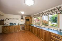  51 Ironmonger Street Calliope Qld 4680  Price 	 Price Guide $600,000 - $650,000 Suburb 	 Calliope Postcode 	 4680 Property Type 	 Acreage/Semi-Rural Bedrooms 	 3.5 Bathrooms 	 1.5 Carspaces 	 9 Land Size 	 5 Acres YOUR OWN SANCTUARY ON TOWN DOORSTEP! Superb small acreage on the door step of town. With this package you can have it all! Literally 3 minutes to Calliope, the kids could walk to school.  5 acres of useable land, gorgeous views, spacious home and great sheds. This home has not seen to the market for over 30 years. The current owners have loved the lifestyle and maintained the property the beautifully over this period. Surrounded by glorious easy care gardens privacy is assured.  A completely transformation took place 14 years ago to bring the home to its current standard. Entertaining options are plentiful with rural or mountain views from every corner. Inside the house has been design to capture these for nearly every room. The chef is the home with love the amazing Black Wattle kitchen with gas cook top and electric oven, range hood and loads of storage and bench space. Tiled open living space beautifully appointed. Massive laundry with storage that anyone would be envious of and then there is the linen cupboard.  BIG bedrooms all are built-in and have sliding doors to access outside, giving great ventilation. Huge bathroom with floor to ceiling tiling, separate bath and shower and corner to corner vanity.  Two 3 bay sheds both with power. 1 with 2 automatic roller door, new paint and there is even a toilet! The man around the home will be in his element. Add 100+ Mangoes, full fencing, town water and bore. Seeing is believing here.  