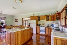 82-84 Old Cedar Track, YELLOW ROCK NSW 2527 Cedar Ridge - Simply Amazing Views House on Acreage - Property ID: 714858 Perched high on Cedar Ridge on 70 acres this home (lifestyle) is designed to take in the awesome views over Albion Park and looking right across Lake Illawarra.  "Simply amazing views!" The main home features a massive wrap around bull nose verandah keeping the home cool in summer and warm in winter and to be honest just giving that country ranch style living. The home is massive and open with the owner successfully capturing loads of natural light with classy oversized windows and high 2.7 meter ceilings. The massive kitchen boasts walk in pantry, huge stove/oven and opens onto a 10 metre long family and dining room so you can entertain with family and friends close by. You won't miss the 6 x 8 meter living/billiard room with huge fire place. Main bedroom is huge with ensuite and corner spa, separate shower and large walk in robe. And like any true farm house the laundry features an additional shower/toilet "mud room" to clean up after an enjoyable day on farm.Three more rooms in main home have built in robes and average 3.2 x 3.6 metres ducted cooling/heating throughout.  The second home "Weekend Retreat" started its life as a huge shed and was modified as a 3 bedroom weekender while the main home was built. This home is a full home and so country, filled with charm. The large open kitchen boasts a wood cooker that heats the water also yes back up hot water available! Open plan living off kitchen and 3 full sized rooms with built in robes. Great views once again from this home with its own fenced in country yard - reminds me of a bed and breakfast cottage home. Water is supplied from a gravity feed from the natural water fall and has never run out, stored in a 20,000 gallon tank. Yes, there is electricity and seep away sewerage. Austar and television in all rooms.  Approximately 20 acres cleared maybe more and huge potential to clear more. This property is a lifestyle and a hobby farm, cows graze leisurely, I think I even saw the pig and cow out of babe looking in the house window! Incredibly private, warm and just so worth an inspection, it may just change your life.  Why will you love this home? A few notes from the owner ...  o 	 The peace and quite giving the feeling that we live out in the country, yet are less than 10mins from Albion Park town centre, 15 mins to the freeway and railway station. Giving us the best of both worlds. o 	 We love the wake up call from the birds, and the abundance of wild life. o 	 The spectacular view over Lake Illawarra and surrounding suburbs. o 	 This is a very secure area to live, its "Paradise" Council Rates: $2,774.84 p/a approx Zoning: E3 Environment Management Land Area: 27.9700 hectares Contact Robb Grubb 0411 315 450 or 42266772 for a private viewing or come along to our next open. All information contained within this advertisement is gathered from sources Professionals Wollongong believe to be reliable. Professionals Wollongong cannot however guarantee its accuracy and interested parties should make and rely on their own enquiries.   Print Brochure Email Alerts Features  Land Size Approx. - 27.97 hectares 