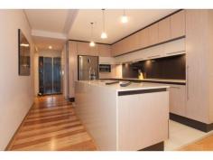  21/155 Adelaide Terrace East Perth WA 6004 TWILIGHT OPEN, 5.30 -6pm, Wed, 24th PRICE SLASHED! LAST CHANCE or OWNER WILL LEASE! Stunningly situated on Level 10 of the ultra-modern “Rise” complex, this immaculate two-bedroom two-bathroom apartment defines easy inner-city living and enjoys peace, tranquility and security whilst boasting breathtaking river and city views from a massive wrap around 40sqm balcony and within. Polished Blackbutt timber floorboards lend a low-maintenance feel throughout the home and creates a smooth flow, linking the sleeping wing to the open-plan living and dining area where a spacious kitchen is incorporated into the airy design. The main living zone and both bedrooms each have their own individually-controlled split-system air-conditioners, including a sumptuous master ensemble with mirrored built-in wardrobes, access out on to the balcony for entertaining and a private and stylish ensuite bathroom with a shower, toilet and twin stone vanities. The Guest bathroom-come-laundry services guests and the Guest bedroom that also provides balcony access, whilst the kitchen is luxuriously-equipped with a sparkling stone island bench top, quality glass splashbacks, a Bosch electric cook top, oven, exhaust and a Miele dishwasher. Absorb the sun glistening or the night city lights reflecting on our picturesque Swan River and choose to either nest or invest in this East Perth gem, just footsteps from convenience stores, cafes, Langley Park and more. With free buses along St George’s Terrace, this is your gateway to our vibrant CBD! Other features include: • 2 bedrooms, 2 bathrooms * Level 10 * Very generous 89sqm of internal living with separate sleeping wing • Shower, toilet, twin stone vanities and laundry appliances in Guest bathroom • L-shaped alfresco balcony for entertaining and quiet contemplation whilst indulging in mesmerising views of our beautiful Swan River and its city surrounds • Audio intercom system, secure lift access from Grand Lobby entrance • Feature down lighting • Quality blind fittings throughout • Shadow line cornices • Moments from Perth train station, free city CAT buses, cafes, restaurants and shopping * Resort facilities include a resident’s lounge/function room, a shimmering infinity-style lap swimming pool, sauna, spa and gym – and there is also one secure car parking bay plus storage available. * Anticipated Rental Return $750 per week Invest in the East Perth precinct now before more than $3.5 billion worth of infrastructure is completed, including the new Waterbank project located only two blocks from 175 Hay Street, as well as the new Perth City Link, Elizabeth Quay, Perth Light Rail System (MAX), the new Pedestrian Bridge pass to Crown Casino and much more OUTGOINGS: Water Raters: $1,155 per annum Council Rates: $1,502 per annum Call Melissa Green on 0437 702 708 today to arrange your viewing Area: 90 Sqrs Land:: 144 Sqms Features larger balcony • ample storage • polished floorboards • 3x AC units • Ensuite • Outside Spa • Remote Garage • Swimming/Lap Pool • Intercom • Gym • Polished Timber Floors • Dishwasher • Courtyard • Built-ins • Balcony • Air Conditioning •  