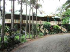  1227 Teven Rd Alstonville NSW 2477 ALSTONVILLE MANSION - OFFERS PLEASE ALL OFFERS CONSIDERED - OWNER WANTS TO MOVE NORTH.  This very grand Federation home which is set on a level 5.242 acres of land and only a few minutes drive into Alstonville Village. Entering through the front door you will be surprised by the high ceilings & spacious foyer. Comprising of eight bedrooms, five bathrooms, two kitchens & four living areas this beautiful home is now ready for a new family to appreciate, update and enjoy the space and surroundings. The ground floor has a spacious living area, kitchen, separate dining and family bathroom plus a single lock-up garage. Upstairs, a large timber kitchen & combined family room, formal dining, lounge & separate living or study. The third level has a loft bedroom with own bathroom. A large deck surrounds the upstairs living with impressive entry stairs and rear stairs. An extremely large shed with cool room plus an additional shed with a two bedroom studio. Garaging for at least six vehicles in the main shed if required. Subject to council approval this property would be perfect for a Bed & Breakfast Establishment or for the large extended family. Undoubtedly this home and infrastructure could not be replaced for the asking negotiated price. Take advantage of the low interest rates. Exceptional value. 