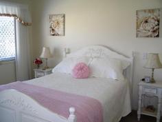  18/6-42 Quinzeh Creek Rd Logan Village QLD 4207 Opal Gardens is located in Logan Village and is set up to reward baby boomers with all the good things in life. An abundance of luxury resort facilities enables the residents to experience the over 50s country club lifestyle every day. This pet friendly resort has access to a further 22 hectares of lush forest parkland with natural walking tracks and exercise stations dotted along the banks of Quinzeh Creek. The location captures the best of the growth corridor between Brisbane and the Gold Coast. This very well presented two bedroom home is set on a large site and is ready to move into and start living the dream. Inside is a neutral colour scheme ready for you to add your own touches and the covered alfresco area has electric operated blinds and overlooks the lovely established gardens. The home offers easy living with all the modern conveniences.  