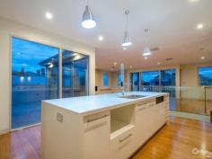  2 Stevedore St Williamstown VIC 3016 Simply Stunning. A truly spectacular brand new home located on the footsteps of one of Melbourne's most prestigious waterfront addresses, The Strand.  Featuring exceptionally large reverse living and dining spaces with gas fireplace, front facing entertainers' balcony plus second terrace balcony at rear, taking in outstanding bay and city views.  Designer kitchen with two Miele ovens, beautifully finished with Caesar-stone bench-tops, insinkerator and butler's pantry.  Three ground floor bedrooms with Daikin split system cooling/heating and their own stunning bathroom, master with dressing room/walk-through robe and stone bath.  Ground level landscaped gardens is the perfect space for the kids to play. It is also a wonderful area with direct access off a generously proportioned family room/formal living zone.  Huge double garage with tiled floor, ideally suited for entertaining via bi-fold glass doors to rear rendered walled outdoor living area. Also features evaporative cooling upstairs, full security system plus a ducted vacuum system.  All literally a one minutes walk from the Nelson Place eateries and the Strand foreshore area.  Further details and private inspection by calling;  Anthony Gunn 0409 377 449  Kevin Gunn 0418 997 914 