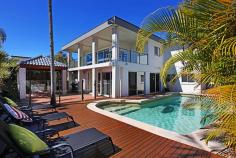  7 San Michele Ct Broadbeach Waters QLD 4218 North Facing Big' Waterfront Home with Views of Surfers Paradise House - Property ID: 748675 Fabulous location position! A big family home with plenty of room inside and out. Stunning outdoor pool, BBQ, alfresco dining and lawn area for children and pets. Private areas to retreat to, you will love this home, it has a great feel, atmosphere and character. Not your everyday home, full of interest and space!  Master bedroom has large ensuite and double built in robes. 4 bedrooms in total plus a study come media room. Upstairs has a wonderful big living area with gorgeous views of Surfers Paradise and all day sun. Overlooking the canal with golden sandy beach. Fantastic jetty to use/ sit & enjoy the surroundings. 3 bathrooms in total, 2 car parking plus space for more vehicles. Owner interstate and wants it sold price genuinely negotiable.  Fantastic jetty to use and sit and enjoy the surrounding views of Surfers Paradise. Gold Coast light rail proving to be a real bonus to the public good news!   Print Brochure Email Alerts Features  Close to Shops  Close to Transport  Formal Lounge 