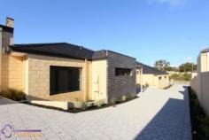  47B Ravenswood Drive, NOLLAMARA WA 6061 NEW VILLAS BUILT BY INSPIRED HOMES - ONLY 2 LEFT With SMEG Stainless Steel appliances and Lawn Bowls on the other side of the road, these differ from the rest, hence one already sold. Visitors will not find parking difficult here and we all know that is most certainly an advantage. This 3 bedroom, 2 bath villa (No Strata Fees) is built by the award-winning Inspired Homes and comes with the following... Kitchen - White stone bench tops - Soft close cabinets - Tiled splash-back - SMEG Stainless Steel Electric Oven 60 cm - SMEG Stainless Steel Gas Hot Plate 60 cm - SMEG Stainless Steel Dishwasher - Stainless Steel Range Hood Living / Dining Area - 3 Step profile cornices and 3 metre high coffer ceiling with low voltage lighting - Open-plan living area with 600 x 600 mm Porcelain Tiles  - Split-system air-conditioning and a gas bayonet Master Bedroom - Carpet - Built-in wardrobe (full frame mirror sliding door) - En-suite with his/hers wash basin, mosaic feature tiling and soft close toilet seat Bedroom 2 and 3 - Built-in wardrobe (full frame mirror sliding door) - Carpet 2nd Bathroom - Shower and separate bath - Mosaic feature tiling - Separate W/C with soft close toilet seat - Skylight Laundry - Separate linen cupboard and separate courtyard for drying your laundry out of view! Brilliant! The Rest - Security Alarm with 3 motion sensor, siren and owner notification - Alfresco with exposed timber beams - Silver Venetian Sun Block Blinds - Security Sensor Front Entry / Driveway Lights - Fully landscaped with automatic reticulation - Insulation R4.0 Fibreglass Batts 