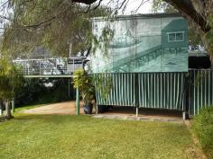  2 Loton Rd  Dawesville WA 6211 Be sure not to miss this well-priced property in a great location! Why not start your day, every day, to the hidden treasure of Dawesville, with the estuary shores just a short stroll and a boat ramp nearby, you could either demolish the existing house or create your home out of this humble abode.  The two bedroom one bathroom holiday home has a large decked area offering views of the estuary with the backdrop of the distant hills and is on a 818m2 block and offers plenty of room for the boat, plenty of parking for the cars and under cover parking for boat or caravan.  Whether you’re looking for the holiday retreat, for the weekends or summer holidays this area is an ideal location for a holiday property or build your own dream home just the way you want it! 