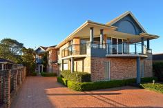 4/213 Ocean View Rd Ettalong Beach NSW 2257 This attractive townhouse apartment is located near the beautiful Ettalong Beach waterfront in a full security complex ! Enjoy this exclusive position so close to the popular Ettalong markets, restaurants, cinemas and marinas .Boasting luxurious appointments throughout that include 2 full bathrooms, ensuite, 4 spacious bedrooms, main with walk-in robes! Impressive lounge and dining room views a landscaped courtyard awash with natural light! Fabulous interiors, stunning kitchen with all modern appliances and includes a new self-cleaning Miele oven!All year comfort is guaranteed with split system air-conditioning on both levels.This private residence is surrounded by sensational sculptured gardens !The property has 2 secure car spaces and a separate locked storage area assigned to this property . An absolute pleasure to inspect !  