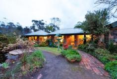 460a Maroondah Highway, Healesville VIC 3777 WARAWONG' FULL OF OPPORTUNITY AND ESCAPE House - Property ID: 744713 
 
 
 Located well off the highway just out of Healesville township 
is the approx. 2 acres offering a blissful country escape lifestyle with
 income potential. Here the charmingly unique 3 bedroom brick and 
bluestone home can boast garden vistas from its every angular room, a 
fantastic merbau deck to relax on, high timber ceilings throughout and 
the charm of French doors. Immaculately appointed and presented this 
comfortable home with inviting living and dining rooms, 2 bathrooms and 
smart modern kitchen is your low maintenance escape. With central 
heating, Coonara wood fire, comfort is premium. And the lovely pond with
 waterfall and lush gardens is a great escape. 
Above the large brick and bluestone double garage (with pit) sitting at 
the top of the sweeping circular drive is a charming loft with pretty 
dormer windows and pitched roof. Superbly self contained and cute as a 
button this impressive abode with private entry and drive way to carport
 is the perfect B&B experience for semi retirees to enhance income, 
or as a studio/home office or independent family accommodation. Whatever
 you do, opportunity and comfort is ready and waiting to be enjoyed 
 - See more at: 
http://www.methven.com.au/real-estate/property/744713/for-sale/house/vic/healesville-3777/460a-maroondah-highway/#sthash.IFNlNwm0.dpuf WARAWONG' FULL OF OPPORTUNITY AND ESCAPE House - Property ID: 744713 Located well off the highway just out of Healesville township is the approx. 2 acres offering a blissful country escape lifestyle with income potential. Here the charmingly unique 3 bedroom brick and bluestone home can boast garden vistas from its every angular room, a fantastic merbau deck to relax on, high timber ceilings throughout and the charm of French doors. Immaculately appointed and presented this comfortable home with inviting living and dining rooms, 2 bathrooms and smart modern kitchen is your low maintenance escape. With central heating, Coonara wood fire, comfort is premium. And the lovely pond with waterfall and lush gardens is a great escape. Above the large brick and bluestone double garage (with pit) sitting at the top of the sweeping circular drive is a charming loft with pretty dormer windows and pitched roof. Superbly self contained and cute as a button this impressive abode with private entry and drive way to carport is the perfect B&B experience for semi retirees to enhance income, or as a studio/home office or independent family accommodation. Whatever you do, opportunity and comfort is ready and waiting to be enjoyed 