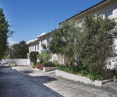  5/275 Edgecliff Rd Woollahra NSW 2025 A peaceful mews-like setting, sunny north aspect & generous proportions make this
	 townhouse a wonderful easycare home. Secluded from the road at the end of a private drive,
	 Kew Place is a boutique collection of 12 residences reminiscent of an English mews &
	 located between the chic attractions of Queen Street Village & the leafy tranquillity
	 of Cooper Park. The first time offered in over 30 years, it features a spacious dual
	 level layout with potential to create a fourth bedroom or study & is close to 
	Edgecliff station & Westfield Bondi Junction. 
 Whisper-quiet rear setting, private entry and wide foyer Bay fronted living room bathed in all day northerly sun Dining room opens to a wisteria-framed courtyard Modern granite kitchen, breakfast room or sitting room 3 large bedrooms with built-ins, fresh main bathroom Sun filled master bedroom with en-suite bathroom, walk-in robe sunny balcony & park views Enormous laundry room with scope to create a 4th bed Downstairs powder room, wine cellar, visitor parking Double garaging with mezzanine storage and internal access Generous indoor/outdoor living, scope to update 