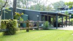 North Tamborine QLD 4272 Positioned on 4 acres, surrounded by native fauna & flora the residence sits majestically amongst manicured gardens. It has been tastefully renovated from top to toe and has superior inclusion with special features include; Traditional polished timber floors & high ceilings Double hung windows, French doors and extensive timber fretwork Country colonial kitchen with custom designed classic cabinetry & stone bench tops For all round comfort, zoned ducted A/C, ceiling fans plus wood heater Master bedroom with window seat & one of a kind stunning ensuite Main bathroom with imported claw foot bath, shower, vanity etc Guest accommodation with w/in robe and powder room Massive deck with adjoining heated, saltwater pool complete with water features… Spacious lounge and adjoining dining room with beautiful old style qualities Computer/office nook featuring gorgeous leadlight window Private “L” shaped verandah blends seamlessly between the outdoors and the indoors Downstairs – generous parking for 3 cars (more space can be developed), laundry A bore provides water for the established gardens You’ve heard the saying a “man must have a shed”….take a look at this “shed”! It is fully insulated, has a split system air conditioner, room for a pool table, its’ own bathroom & toilet plus a full length verandah/ BBQ area. It’s an ideal entertainer’s paradise! This property has too many wonderful features to list, and can only truly be appreciated by a full inspection of this timeless master piece. Call today ….you will not be disappointed! - See more at: http://www.beaudesertproperties.com.au/listings/residential_sale-243646-tamborine/#sthash.yaXUkOr1.dpuf 