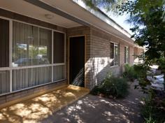 7/25 Lyndavale Dr Larapinta NT 0870 This well presented unit will help you break into the housing market! It is a good size unit in a small complex, single undercover car park at your front door and located back from the main road. Enter the home into the open plan living/dining area which has recently been painted. It features a large bay window which allows in an abundance of natural light. It features a split system air conditioner and carpeted living/dining and tiled kitchen. The kitchen is a very good size for a unit and has been designed with the chef in mind. The oven is centrally located with the sink and cupboards surrounding and only one or two steps away from everything. It has lots of cupboard space, a breakfast bar, and a near new oven. The window looks over the peaceful and private back courtyard. Away from the living/dining area is two large bedrooms both carpeted and both have built in robes. This home is a very comfortable size for a couple or even a couple with a child. The bathroom is neatly presented with a full size shower over bath arrangement. The toilet is completely separate too which is ideal for a young family or housemates sharing. Through the internal laundry you can access the back paved courtyard which is great for entertaining and a garden shed for that extra storage space you might need. This
 well presented unit will help you break into the housing market! It is a
 good size unit in a small complex, single undercover car park at your 
front door and located back from the main road. 
 
Enter the home into the open plan living/dining area which has recently 
been painted. It features a large bay window which allows in an 
abundance of natural light. It features a split system air conditioner 
and carpeted living/dining and tiled kitchen. 
 
The kitchen is a very good size for a unit and has been designed with 
the chef in mind. The oven is centrally located with the sink and 
cupboards surrounding and only one or two steps away from everything. It
 has lots of cupboard space, a breakfast bar, and a near new oven. The 
window looks over the peaceful and private back courtyard. 
 
Away from the living/dining area is two large bedrooms both carpeted and
 both have built in robes. This home is a very comfortable size for a 
couple or even a couple with a child. The bathroom is neatly presented 
with a full size shower over bath arrangement. The toilet is completely 
separate too which is ideal for a young family or housemates sharing. 
 
Through the internal laundry you can access the back paved courtyard 
which is great for entertaining and a garden shed for that extra storage
 space you might need. 
 
If you are looking for a good first start in the housing market and 
don't want to stretch your budget too far, come and inspect this 
excellently priced unit today! - See more at: 
http://www.professionalsalicesprings.com.au/real-estate/property/746837/for-sale/house/nt/larapinta-870/7-25-lyndavale-drive/#sthash.2RGuGol8.dpuf 