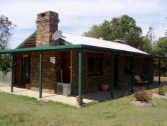  123 Chadwick Dr South Maclean QLD 4280 If you require a bit of space to spread out then this almost 3 acre property is just the thing. Situated at the end of a quiet no through road and surrounded by rural properties, peace and quiet are definitely on the list. A cosy 3 bedroom brick and timber home boasting open fire place and wrap around verandas sits at the front of the property which is very neat and tidy and has plenty of options to extend or renovate. A causal meals area off the kitchen and separate living area with air-conditioning plus 3 good sized bedrooms and a main bathroom complete the home. 