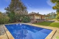  18 Sagars Road Dural NSW 2158 Too Good To Be True! This is one that agents always get asked for "An older home on prime acres in one of the best streets in Dural".  This superb 5.45 acre property is being offered for the first time in over 50 years and it's all about the location making this an excellent opportunity to invest or build in the heart of one of Dural's most sought after locations.  * Over five plus acres with long road frontage and dual road frontage * Quality built 3 Bedroom colonial style home with a north facing aspect * 1 bedroom fully self-contained studio with large living area & separate parking  * Separate entertainment room with bar  * Over five mostly arable acres maintaining privacy with minimal bushland * 4 fenced paddocks, stable and holding yard  * In ground tiled pool and full size tennis court A short stroll to Hills Grammar and only minutes to Dural CBD All information contained herein is gathered from sources we believe to be reliable however we cannot guarantee its accuracy and interested parties should rely on their own enquiries. General Features Property Type: House Bedrooms: 4 Bathrooms: 3 Land Size: 2.21ha (5.45 acres) (approx) Outdoor Features Garage Spaces: 2 Tennis Court Other Features Pool 