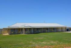  29 Derna Road   Robinvale   Vic   3549 Not only are there heaps of rooms but they're all much larger than average. Set on approx. 1 acre is this 4 year old 50.4 sqm UMR home. 3 large bedrooms - BIR plus Master with over sized ensuite. Kitchen features chef's stove, huge WI pantry & loads of bench space. The open dining & family area overlook the grassed fully fenced yard. Formal entry & Sep lounge room, also a TV room/study. Sweeping verandas, 3 phase ducted R/C air con, Dbl garage with extra toilet. Space for a vegie garden under watering system. Water storage is no problem with 2 x 23,000lt tanks to cater for your 3 Megs & rain water. The entertainment area comes complete with BI brick fireplace. To complete this package is the man shed approx 7.5 x 12m, concrete floor, kitchenette, 3 phase power. A real man's cave!. You will find all this & so much more on this property. Only minutes from Robinvale. An inspection will impress. 
