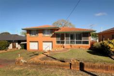  63 Rowbotham Street, Rangeville QLD 4350 Location! Location! Location! Expressions of Interest Today’s your lucky day it’s not every day that homes in this location come onto the market. If you are looking for a project renovate and reap the rewards . Down the road from Picnic Point walking distance to Rangeville school and the new High st Shopping centre. Solid house with great bones just waiting for the next family to come along or the very astute investor  Offering upstairs  4 spacious bedrooms  Family bathroom Downstairs Central Kitchen  Newly Air-conditioned Lounge  Dining Sunroom Second rumpus room  Bathroom/ laundry  Double garage one with remote Approx 4m access down side of house  Rear yard fenced  Citrus trees  
