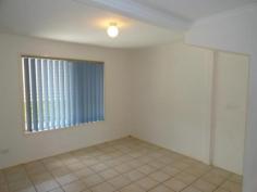  3/20 Lowry Street North Ipswich Qld 4305 Roomy living areas combine with a nice outdoor courtyard to provide 
flowing living and entertaining space whilst the 2 bedrooms are upstairs
 and private. So well located in the centre of North Ipswich, this 
modern townhouse is only a few minutes to Riverlink Shopping Centre and 
Ipswich CBD. Both bedrooms are carpeted and have built-in mirrored robes and ceiling fans. The large bathroom includes shower over bath, toilet, good vanity and the convenience of laundry facilities. Tiled open plan living area includes a modern kitchen with overhead cupboards Split system air-con in the living area Great storage cupboard under the stairs Private fenced Courtyard Single lock-up garage can also be used as further outdoor living This
 great Townhouse is in a small complex of only 6 Units screened by shady
 trees to the front yard and has a small garden area at the front of the
 unit to indulge your green thumb! There is a visitor space to park in 
front of the Unit. It is the perfect residence for couples, singles and
 investors! Potential rent return of $250/wk. Please call for a 
welcomed inspection.   