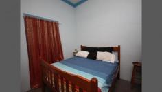  90 Banister Street Brandon QLD 4808 BIG AND CHEAP! Located in a quiet Brandon street, this solid four bedroom brick residence offers so much yet requires so little to become yours. - Spacious layout - Large kitchen dining area - Renovated bathroom - Recent exterior paintwork - Drive through carport to shed at rear - Secure fencing - Walking distance to school, tavern and convenience store General Features Property Type: House Bedrooms: 4 Bathrooms: 1 Indoor Features Toilets: 1 Air Conditioning Outdoor Features Carport Spaces: 1 Garage Spaces: 2 
