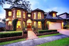  9 Adey Pl Castle Hill NSW 2154 Situated within 10 minutes walk from Castle Hill Towers Shopping centre 
is one of Castle Hill's finest locations 'The Precinct'. Conveniently 
located in one of the Castle Hill's most affluent cul-de-sacs, nestled 
away on 937sqm of prime land, amongst the peaceful natural elements, 
with its own exclusive private road entry. Beyond the discreet & 
disceptive facade of this truly magnificent property lies, an abundance 
of natural sunlight filled interiors, an impressive grand entry foyer, 
coupled with a sweeping granite staircase. This architechically designed
 Masterbuilt residence, built with practically in mind and without any 
expense spared, features luxuries and quality inclusions throughout, 
rarely found in any homes of today. Boasting six large bedrooms, 
consisting of four main bedrooms, all with ensuites & WIR's. The 
ground level also features a large main bedroom, ensuite & WIR, 
complimented with an another nearby full bathroom, a large open plan 
living/rumpus area, laundry, gym & sauna. Seven brilliant size 
contemporary bathrooms, in total. Simply perfect for accommodating 
either the In-laws, dual or multiple families, or guests in full luxury 
& style, which is extremely rare, anywhere throughout Sydney. Simplicity
 in design & perfection in the layout, the1st floor, boasts internal
 entry straight into the main open plan living area of the home, 
featuring a large adjoining balcony with breathless natural bush land 
reserve views, complimented with polished stone floors, a two way 
natural romantic gorgeous gas fireplace, a 'State of the Art' Kitchen, 
featuring European Stainless Steel Appliances, five burner gas stove, 
electric fan forced oven & range hood, D/W, large fridge space, an 
Island bench, and a separate large walk in pantry for the chef at heart,
 complimented with a nearby full bathroom & another full size 
bedroom, with ensuite, WIR, & balcony. A formal lounge & dining,
 all with brilliant backdrop reserve views. 