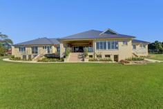  12 Bayfield Rd Galston NSW 2159 Luxurious Acreage! Energise Your Senses With This Home Of True Grandeur. Located just moments away from the heart of Galston and situated on 4.35 acres of land. From the rear of the property your views are loaded with all avenues of nature taking you away from the hustle and bustle of city life. This home is architecturally designed and no cost has been spared. The incredible "WOW" factors being highlighted in the most tasteful way. INTERIOR FEATURES: - Huge master bedroom with dual access walk-in wardrobe leading to luxurious private bathroom. Double exterior doors leading to paved balcony enjoying the tranquil views. - 5 King size bedrooms each with en-suite (2 with spa baths). - Savannah-style plantation shutters. - Kitchen with brand new European quality stainless steel gas appliances, twin dishwashers, stone bench-tops, 2 integrated ovens, fridge/freezer x 2 and coffee machine. - Separate combined preparation kitchen and pantry. - Extensive formal and informal living areas with realistic gas fireplaces. - Full size wet-bar with adjoining games room. General Features Property Type: House Bedrooms: 6 Bathrooms: 6 Land Size: 1.76ha (4.35 acres) (approx) Outdoor Features Garage Spaces: 7 