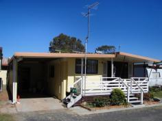 Site 71 The Anchorage Holiday Pk Iluka NSW 2466 SO YOU WANT VALUE FOR MONEY! Nestled in the very popular Anchorage Holiday Park, Iluka. NSW, only a stone’s throw from the mighty Clarence River, sits this compact and tidy mobile home. Consisting of 2 bedrooms, both carpeted and with built-ins and the 2nd bedroom having it’s own Air/Con unit, and the main bedroom adjacent to the tiled bathroom/toilet. A very tidy kitchen with gas stove, comfortable lounge /living area that opens on to a covered and fenced front verandah, an internal laundry and a large under cover garage with extra storeroom at the rear completes the under roof area. Park fees are $225 per fortnight, water costs around $14/month and electricity costs around $40/month, with the current owners. The property is connected to power, town water and sewerage and has a new gas hot water system. No contracts are required for this sale therefore there are no solicitors costs, however a Bill of Sale will need to be signed. The present owners are looking to move back to the bush for personal reasons, have already purchased their new home and are packing up now to move so the home will be vacant within the next 2 weeks – they are keen sellers. The Anchorage holiday Park is in a beaut position, has a friendly feel to it and suits the laid back lifestyle with Golf, Bowls and excellent fishing available to all who live in Iluka. Owners are asking only $90,000 for this home and are keen to sell – all offers will be looked at. Please contact either Ian Dunbar or Warren Tucker at Yamba Iluka Real Estate for an inspection of this property. Property:    House Bedrooms:    2 Bathrooms:    1 Parking:    1 Council:    Clarence Valley Council