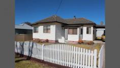  21 High St Tenterfield NSW 2372 Solid Investment Priced to sell, this 3 bedroom home is listed for immediate sale. Bedrooms are spacious, main bathroom with shower over bath, kitchen/family/dining with wood heater, formal lounge area, covered entertaining area at rear. A large powered garage ideal workshop, carport, garden shed set on 910.5m. 