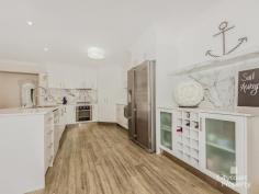  18 Ragamuffin Dr W Coomera QLD 4209 Property ID: 105999903 Overview Land Size: 	 825m2 		 Bedrooms: 	 5 Pricing: 	 $549k - $589k Buyers 		 Bathrooms: 	 2 Sale Format: 	 Exclusive 		 Garage: 	 2 "BEACH CHIC" - STYLE and LIFESTYLE on 825sqm block *SELLER BOUGHT ELSEWHERE INSPECT TODAY* This elegant, 'feel-good' abode proudly shows the touch of its interior designer owner who has created both an entertainer and a sanctuary where contemporary yet, neutral finishes are the hero. With effortless indoor/outdoor living and numerous living spaces this is a large, quality, property offering space to sprawl. Located within "Coomera Waters," you'll join an award winning, community-minded estate that boasts upmarket homes and access to exclusive recreation clubs. Cancel your gym membership and enjoy everyday access to lap pools, tennis courts and sports facilities at your doorstep. Combined with 24 hour security and your very own harbour, this address is something special. PROPERTY FEATURES • 4 Bedrooms all with built-in-robes (walk-in-robe to main) • Study or 5th bedroom • 2 Bathrooms (including ensuite to main) • 2 Separate living areas including open plan dining and family lounge • Covered alfresco entertaining area overlooking rock garden and spa • Outdoor spa • HUGE fully fenced back yard with room for pool or other yard sports • Central well appointed kitchen with stone benches and stainless steel appliances • A/C to Main living and master bedroom • Double lock up garage with excellent shelving and storage • Commercial grade flooring • Calming neutral colour scheme to suit any style of furniture ACCESS TO EXCLUSIVE RECREATION CLUBS Enjoy the facilities at the TWO(2) resident recreation centres that provide • Lap pool (heated) • Tennis courts, • Gym room • Spa • Sauna • Kitchen for social gatherings. COOMERA WATERS ESTATE OFFERS • 24 hour security • Fishing Jetty • Resident boardwalks around the harbour and marina • Coomera Waters Marina Shopping Village (small shops, restaurants, cafes) • 72-berth marina • Sandy beach for swimming • Low body corp Our owners are committed to a move and are motivated to sell. We welcome your inspection anytime by appointment or at our scheduled open homes. Features Indoor 	 Outdoor 	 Security 	 Eco A/C 	 Covered Alfresco 	 Fully Fenced 	 Study / 5th Bedroom 	 Huge Yard 	 Patrolled Security 	 Stone Bench Kitchen 	 Spa 	 Quiet Estate 	 2 Separate Living 	 Recreation Clubs 		 Commercial Flooring 	 