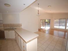  7 Mornington Terrace ROBINA Qld 4226 An architecturally inspired, generously proportioned 4 bedroom home with high ceilings, large separate living areas and huge pool plus waterfall and perfectly positioned in a quiet and convenient cul-de-sac with park and waterfront homes opposite. ~ Ducted zoned reverse cycle air conditioning  ~ North facing pool and outdoor entertaining area  ~ Large inspiring entrance foyer  ~ Timber shutters  ~ Certified pool fencing  ~ Gas hot plates and gas heater for pool  ~ Ensuited master bedroom with spa bath  ~ Overseas owner has priced for immediate sale. Holiday all year around yet still be within walking distance to shops, transport etc. 
