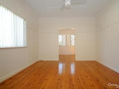 12 Power St Harristown QLD 4350 NEAT AS A PIN…. NOTHING TO BE DONE 
Whether you're a first home buyer or investor, you need to hurry here. 
Positioned on a 396m2 fully fenced, low maintenance block, this spacious
 two built-in bedroom, fully security screened home, with ceiling fans 
and polished cypress timber floors throughout, has a large lounge room, 
huge eat-in modern kitchen with plenty of cupboards, plus a very 
adaptable sitting room/office area, and modern bathroom. There's a great
 paved entertainment at the rear of the home, a full concrete driveway 
to an extra large carport plus a 5000 litre rainwater tank with pump for
 the garden or washing the car. This home is walking distance to 
Clifford Gardens Shopping Centre, and has been rent appraised at approx 
$285 per week. 