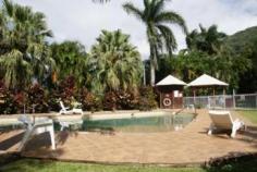  405/241 Coral Coast Drive Palm Cove Qld 4879 Description: Price reduced again for this brilliant opportunity to have your own poolside piece of paradise, this fully furnished apartment is complete with: * Corner kitchen with upright oven & cooktop, fridge/freezer, microwave & dishwasher * Spacious master bedroom with built in robe * 2nd Bedroom fitted with double bed + bunk beds * Tiles throughout living areas & carpets to bedrooms * Bathroom with internal laundry with washer & dryer Its all here on the ground floor and overlooking one of the many pools in the complex. BBQ areas are scattered amongst the lush tropical gardens of the estate. Call the agent now to organise you private viewing of this super apartment 