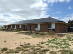  Loxton North SA 5333 Extra Large Family Living Set on an allotment of 5,814m2 close to the golf course and located amongst other quality built homes. This near new home was designed for a large family and offers very spacious rooms for easy living. The main bedroom is distanced from the other four bedrooms, is very roomy and is carpeted with a walk-in wardrobe and neat ensuite bathroom. Three of the other bedrooms also feature built-in sliding robes, carpet and ceiling fans. A choice of 2 living areas inside, with the open plan of the family room, dining area and kitchen being spacious and perfect for everyday living. The carpeted lounge room makes a great alternative living area, perfect to separate parents from the kids. The kitchen features an excellent work area with an abundance of built-in cupboards, bench space, a dishwasher, underbench oven and room for a larger fridge and freezer. The main 3 way bathroom is perfect for larger families and is decorated in a very nice white and charcoal colour palette with a separate shower and bath. The laundry is also very neat and spacious with built-in cupboards for storage. The home is kept very comfortable with many reverse cycle inverter split system air-conditioners and ceiling fans. Outside is a stunning entertaining area which spans the entire length of the home. It's well designed with 2 wide gabled sections and is fully paved. The large rear yard is fully fenced and there is still plenty of room beyond to add further shedding or whatever you desire. A 2 car garage under the main roof keeps your vehicles secure and out of the weather. Other features include good rainwater storage, a solar hot water system, biocycle septic and trees planted along the boundaries. For further details, please contact Violet Patty on 0468 388 390. RLA: 61544 