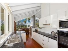 18B Prahran Ave Frenchs Forest NSW 2086 This is a rare 
opportunity to secure a truly stunning and unique family entertainer in 
one of Frenchs Forests most sought after locations. Within short 
walking distance to schools, shops and transport you will be able to 
take advantage of all that Frenchs Forest and Davidson has to offer. Situated
 on a generous 2238m2 block, its impeccably presented 3 bed, 2 bath 
layout takes full advantage of its private tranquil setting with 
uninterrupted tree top views as far as the eye can see. Boasting 
large vaulted ceilings with floor to roof glass, newly renovated gourmet
 kitchen, open plan living areas, wrap around entertaining balcony 
overlooking the resort style pool. This property is one that cant be missed! - Beautifully finished gourmet kitchen with granite bench tops. - Open plan entertaining and dining rooms with uninterrupted views. - Generous 2238m2 block with a sun drenched North East aspect. - Wrap around entertaining balcony overlooking the solar heated resort style pool. - Vaulted ceilings with floor to roof glass. - High quality Blackbutt timber flooring. - Air conditioning throughout. - Gas heating and Bosch instant hot water. - Large double lock up garage with undercover parking for four. - High Quality Bathrooms with heated floors and towel racks.   Property Features:     3 Bedroom     2 Bathroom     4 Parking     2238m2 Land Size 