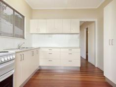  14 GERLEE Tennyson Qld 4105 FULLY RENOVATED, VERY WELL MAINTAINED, POLISHED FLOORS THROUGHOUT, SPACIOUS LIVING, 3 LARGE BEDROOMS, EAT-IN KITCHEN, DECK, SECURE GROUND LEVEL
UNDER CONTRACT. This immaculate highset three bedroom home has been fully renovated including newly painted interiors throughout, freshly polished floors throughout, a new large contemporary eat-in kitchen with quality finishes and a generously proportioned stylish modern bathroom.

Outstanding features of this property include the large living area which creates an abundance of space to spread out and creates an open and relaxed ambience for the property. The spaciousness of the living area provides the opportunity for multiple uses including different configurations of dining, lounge and study area to suit your lifestyle.

The property is situated on a level and fully fenced 405 square metre allotment. The ground level including laundry is secure and includes accommodation for two cars and ample storage and work areas. A rear covered balcony features a pleasant outlook over the large back yard back against a backdrop of trees. 