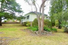  37 St Georges Crescent Faulconbridge NSW 2776 Positioned close to shops, schools and railway, this neat and tidy home awaits, this home is ready for you to personalise and make your own. With two extra-large bedrooms of accommodation, up-dated kitchen and closed in sunroom, this home is perfect for someone looking to get into the property market. Don't hold off any longer - come and have a look! Features include: - Spacious open plan living - Sunroom  - Laundry with original cement sinks - Timber floor boards - Up-dated kitchen - Corner block 689m2 - Lock up single garage We welcome you to call Bartons Real Estate on 02 4751 5199 to book your inspection. 