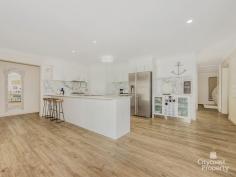  18 Ragamuffin Dr W Coomera QLD 4209 Property ID: 105999903 Overview Land Size: 	 825m2 		 Bedrooms: 	 5 Pricing: 	 $549k - $589k Buyers 		 Bathrooms: 	 2 Sale Format: 	 Exclusive 		 Garage: 	 2 "BEACH CHIC" - STYLE and LIFESTYLE on 825sqm block *SELLER BOUGHT ELSEWHERE INSPECT TODAY* This elegant, 'feel-good' abode proudly shows the touch of its interior designer owner who has created both an entertainer and a sanctuary where contemporary yet, neutral finishes are the hero. With effortless indoor/outdoor living and numerous living spaces this is a large, quality, property offering space to sprawl. Located within "Coomera Waters," you'll join an award winning, community-minded estate that boasts upmarket homes and access to exclusive recreation clubs. Cancel your gym membership and enjoy everyday access to lap pools, tennis courts and sports facilities at your doorstep. Combined with 24 hour security and your very own harbour, this address is something special. PROPERTY FEATURES • 4 Bedrooms all with built-in-robes (walk-in-robe to main) • Study or 5th bedroom • 2 Bathrooms (including ensuite to main) • 2 Separate living areas including open plan dining and family lounge • Covered alfresco entertaining area overlooking rock garden and spa • Outdoor spa • HUGE fully fenced back yard with room for pool or other yard sports • Central well appointed kitchen with stone benches and stainless steel appliances • A/C to Main living and master bedroom • Double lock up garage with excellent shelving and storage • Commercial grade flooring • Calming neutral colour scheme to suit any style of furniture ACCESS TO EXCLUSIVE RECREATION CLUBS Enjoy the facilities at the TWO(2) resident recreation centres that provide • Lap pool (heated) • Tennis courts, • Gym room • Spa • Sauna • Kitchen for social gatherings. COOMERA WATERS ESTATE OFFERS • 24 hour security • Fishing Jetty • Resident boardwalks around the harbour and marina • Coomera Waters Marina Shopping Village (small shops, restaurants, cafes) • 72-berth marina • Sandy beach for swimming • Low body corp Our owners are committed to a move and are motivated to sell. We welcome your inspection anytime by appointment or at our scheduled open homes. Features Indoor 	 Outdoor 	 Security 	 Eco A/C 	 Covered Alfresco 	 Fully Fenced 	 Study / 5th Bedroom 	 Huge Yard 	 Patrolled Security 	 Stone Bench Kitchen 	 Spa 	 Quiet Estate 	 2 Separate Living 	 Recreation Clubs 		 Commercial Flooring 	 