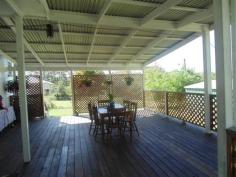 61 Charles Street KENILWORTH Qld 4574 This 4 bedroom home is a Cracker.....  New Kitchen  Formal lounge & spacious family room  2 bathrooms & toilets  Covered front verandah  Enormous covered deck with great views  Hardwood chamferboard on exterior walls  Double carport and double roller door garage for 4 cars on 800m2 