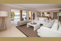  Carrara QLD, 4211 This prestige home enjoys a separate two bedroom guest residence, swimming pool, floodlit championship tennis court, helipad and 75 meter river frontage across the Nerang River to The Royal Pines Resort with sweeping 200 degree north-east views. Celebrity House is only ten minutes from Pacific Fair on Queensland's Gold Coast and the beaches of Surfers Paradise. Set on two prime acres on two titles, this expansive home of 100 squares now exquisitely reappointed, offers an idyllic waterfront lifestyle with direct Broadwater access and the freedom of absolute privacy for a large family & their guests. 