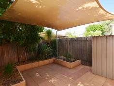  1/8 Lovegrove Drive Araluen NT 0870 A welcomed surprise! Hidden behind the common exterior is a unit that demonstrates great planning and elegance from top to bottom and all the way through to the outdoors.  Walk into the tiled open plan living and dining room with split system air conditioning. The living opens through to the modernised kitchen with Miele Appliances. Upstairs are two great sized bedrooms with built in robes and the master with a private balcony with great views. The outdoor area is paved with a shade sail and simple yet functional landscaping that finishes the area off very nicely. If you are looking for a no fuss and low maintenance rental this is also a great one to add to the list. General Features Property Type: Unit Bedrooms: 2 Bathrooms: 1 Indoor Features Split-system Heating Split-system Air Conditioning Air Conditioning Outdoor Features Carport Spaces: 1 