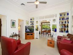 35 Woodrow Dr Coorparoo QLD 4151 Perfect as is....but packed with possibilities! In one of Coorparoo's premier locations, sheltered by towering palm trees, rests this gorgeous original Queenslander. Faithfully restored and maintained by its current owners (only the second in its 90 year history!) the residence and its vast block are a 'must-see' for those seeking a timeless home with plenty of room to grow. Rich in original features, including 11ft VJ walls, stained glass windows, decorative fretwork and traditional lights, its old-world charm has been skilfully preserved. Yet, modern updates in the kitchen, bathroom and home's structure ensure comfortable and low-maintenance living. Specifically, the property now boasts ducted air-conditioning throughout, stainless steel Smeg kitchen appliances as well as new plumbing, roof and electrics. Offering perfect spaces for today's growing family there are also endless possibilities for the future. The spacious living areas lead through French doors onto the expansive covered rear deck. A delightful place to entertain, this resort-style outdoor area overlooks an enormous, fully-fenced garden and patio, where the kids (existing or planned!) can ride bikes, play and explore. Meanwhile, you can sip drinks at the deck's bar while chatting freely with the resident 'chef' through the bi-fold kitchen windows! The upper and lower outdoor areas are conveniently linked by a staircase; an ideal inclusion should full advantage be taken of the huge yard, and a swimming pool constructed. Three good sized bedrooms (one with built-in-robe) are serviced by a central bathroom featuring claw-foot bathtub and a separate toilet. The third bedroom could equally function as a home office with convenient entrance at the front of the home. But, should more rooms be desired, the 744sqm block and layout of the residence offer significant potential to remodel, extend the home's footprint on the existing level or raise and build in underneath. Located in a highly sought-after street, surrounded by million-dollar homes, investment in this address would be an investment in the future! And the lifestyle accompanying this locale has seen it become exceptionally popular for families and professionals alike. It is just 5km from the CBD, a short walk to Coorparoo railway station, on the doorstep of Wembley Park with access to walking and riding tracks, and within close proximity of private and state schools, shopping amenities and café/dining precincts. The owners have loved and nurtured this traditional home for nearly two decades. But now, with an interstate move fast approaching, their instructions are clear.. It must be sold! Seize the opportunity and inspect now!   Property Snapshot Property Type: House Construction: Weatherboard Zoning: Inner Residential Land Area: 744 m2 Features: Air-Conditioner in Main Bed Airconditioned Built In/s Close to Parks Close to Schools Close to Shops Close to Transport Deck Dining Room Dishwasher Established Gardens Fenced Back Yard Fenced Front Yard Garden Shed Gas Hot Water Gas Stove Hardwood Timber Floors Lock Up Garage Lounge Room Outdoor Entertaining Quiet Street Renovated Separate Toilet Spacious Stainless Steel Appliances Storage Study Suburban Views Sunroom Undercover Entertainment Area Water Tank