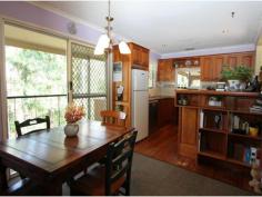  Samsonvale Qld 4520 Nestled among private bushland, this delightful highset home is privately positioned on 2.5 acres and yet only 10 minutes from Samford and approximately 20 minutes from the rail link to Brisbane CBD. Privacy assured, this well maintained country retreat enjoys distant views over the valley and ranges. 