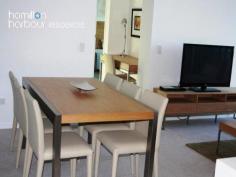 10701 8 Harbour Rd HAMILTON Qld 4007 This spacious 2 bedroom, seventh floor apartment overlooking Hamilton and Eagle Farm Race Track really does have it all. This floor plan has a beautiful open plan layout with large living and dining area that is accentuated by the double glazed floor to ceiling doors embracing the morning sun. The modern kitchen is equipped with European appliances - gas cook top, electric oven and dishwasher plus plenty of bench and cupboard space has direct access to the balcony making it perfect for dining and entertaining with ease. The master bedroom has a separate ensuite, with the second bedroom boasting views up the Brisbane River. Both of which are queen sized. The laundry is cleverly hidden behind closed doors and the main bathroom includes a bath tub for complete relaxation. This is a Pet friendly complex. Located in the hub of the Hamilton Harbour Precinct and 3 minutes walk to Racecourse Rd Village, Brett's Wharf and Portside, you will be in the centre of all the local dining, entertainment, shopping, medical and community services. Close to a variety of public transport options including the BCC City-cat and ferries, trains, bus stops, airports and arterial roads, going places is a breeze. 