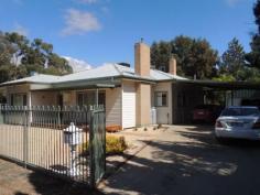  16 Yana St Swan Hill VIC 3585 Very comfortable home set on 1 & 1/4 Acres of lovely treed garden setting with plenty of shedding for an enthusiast. 
 
Three bedroom, vinyl clad home features lounge, gas heating, ducted 
cooling, eat in kitchen, breezeway and renovated bathroom. A large 
steel framed outdoor area is a great spot to enjoy the treed garden 
views. The three car, steel framed, concreted floored carport is 
adjacent to the bigger than double garage. 
 
Set well down on the block is a four bay garage, powered and ideal for 
boat caravan and workshop. A rotunda is amongst the trees and many 
happy barbeques would be enjoyed by the family. The property has a 
3.1MGL water allocation to keep the massive gardens green. Make no 
mistake this is a terrific, affordable lifestyle property, situated in 
Swan Hill. 
 
   
 
 Property Snapshot 
 
 
 
 Property Type: 
 Small Acreage 
 
 
 Construction: 
 Vinyl Cladding 
 
 
 House Size: 
 135.00 m 2 
 
 
 Land Area: 
 5,061 m 2 
 
 
 Features: 
 
 Built-In-Robes 
 Ducted Cooling 
 Established Gardens 
 Gas 
 Lounge 
 Pergola 