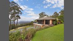  17 Bellbird Ave Kurrajong Heights NSW 2758 In A Class Of It's Own Commanding exquisite panoramic views to the Sydney CBD this very private 32 acres offers a blend of cleared open pasture and pristine bush land with an abundance of native wildlife right at your doorstep. Cleverly designed to maximize natural sunlight, the spacious and versatile interior includes three separate living areas on two levels featuring full width glass walls that showcase the views beyond. A stylish kitchen with granite bench top adjoins a casual dining space that flows outdoors to a wide wrap around verandah and alfresco dining area. A magnificent downstairs entertaining area with built in bar, cozy open fireplace, king sized guest bedroom and bathroom opens onto a sweeping manicured lawn with a solar heated, salt water inground swimming pool. For the tradesman or home business, there's a quality sealed driveway to a large 10 x 10m high bay shed with mezzanine, water and power and triple car garaging. Features: Entry foyer, spacious open plan living with quality kitchen, electric cooking and dishwasher Huge formal lounge and dining with slow combustion fireplace and split system A/C 4 upstairs bedrooms with BIRs, including spacious master with ensuite and WIR Downstairs guest room, bathroom and huge rumpus/billiards room with bar and open fire 9ft ceilings, quality tiling and carpets throughout, ceiling fans to all bedrooms, bottled gas Internal access to triple car garaging, 120,000 ltr concrete water tank 10 x 10m (100sqm) shed with mezzanine, water and power Private entrance gates, extra-long quality sealed driveway and plenty of off street parking Wide open pasture with motor cross track, ideal for a hobby farm 